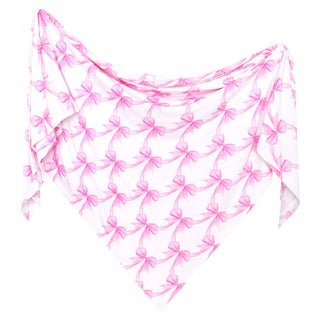Copper Pearl Bamboo Swaddle Blanket - Bow My Gosh
A white triangular scarf with a repeating pink bow pattern, styled as if worn or draped like a bandana.