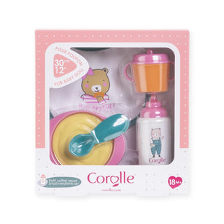 Corolle Baby Pink Small Mealtime Set for 12" Doll
Corolle baby mealtime set packaging with pink lid, yellow bowl, and other items on a white background