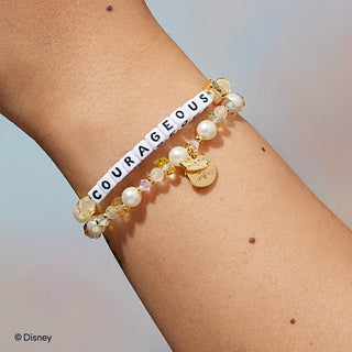 Courageous Little Words Project Bracelet - Disney Princess: Belle
Bracelet with 'COURAGEOUS' charm on a wrist against a neutral background