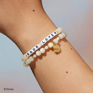 Book Lover Little Words Project Bracelet - Disney Princess: Belle
Bracelet with 'BOOK LOVER' charm on a wrist against a light background