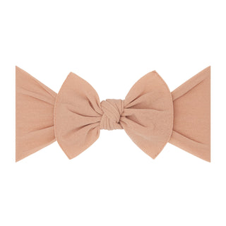 Baby Bling Classic Knot Headband - Blush
Large beige bow on a white background