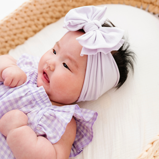 Baby Bling FAB Headband in Shy Violet color, soft fabric headband featuring a stylish knot for baby or toddler accessories.