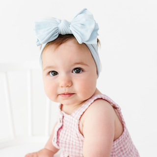 Sky blue Baby Bling FAB headband with soft fabric and knot detail, perfect for stylish baby or toddler accessories.