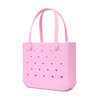 Baby Bogg® Bag - In Love With Bogg - Pink Taffy 
Pink tote bag with heart patterns on a white background