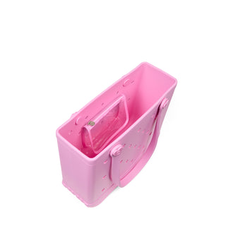 Baby Bogg® Bag - In Love With Bogg - Pink Taffy 
Pink plastic tool carrier with handle on a white background