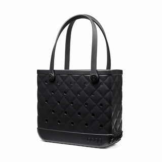 Baby Bogg® Bag - Quilted LBD Black
Black quilted handbag with a visible brand logo on a white background