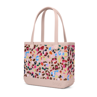 Baby Bogg® Bag - Neon Jungle
Tote bag with colorful leopard print pattern on a beige background
