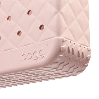 Baby Bougie Bogg® Bag - Quilted Rose Petal
Close-up of a pink shoe sole with 'bogg' branding on a white background