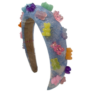 Bari Lynn 3D gummy bear headband in tie-dye denim with colorful, textured fabric and bear-shaped 3D embellishment.