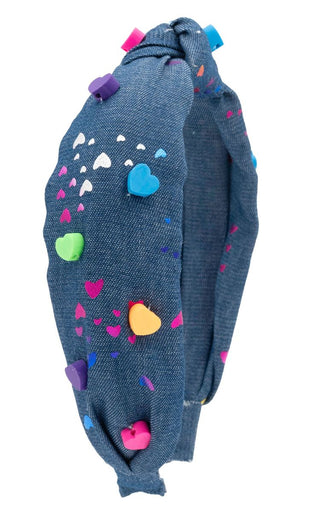 Bari Lynn Denim Splatter Hearts with Rainbow Charms
Blue headband with colorful heart-shaped decorations on a white background
