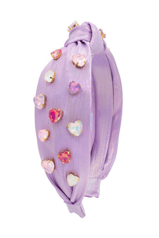 Bari Lynn Jeweled Heart Knot Headband - Lavender
Lavender headband with heart-shaped gemstones on a white background