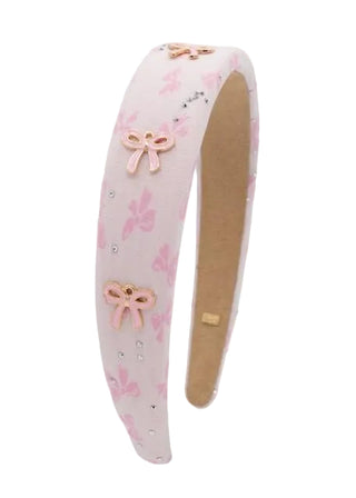 Bari Lynn Padded Crystal Bow Headband - Pink
Pink headband with bow designs on a white background