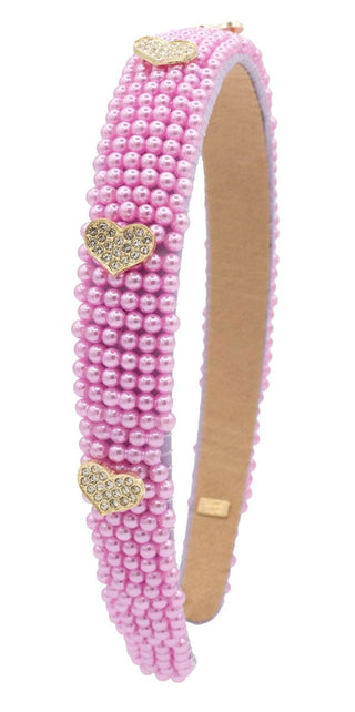 Bari Lynn Pearl Heart Charm Headband - Primrose
Pink pearl headband with decorative heart-shaped clips on a white background