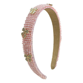 Bari Lynn Pink Pearl Bow Charm Headband - Pink
Pink beaded headband with decorative elements on a white background