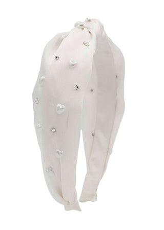 Bari Lynn Satin Pearl Heart Knot Headband - White
White headband with pearl-like embellishments on a white background