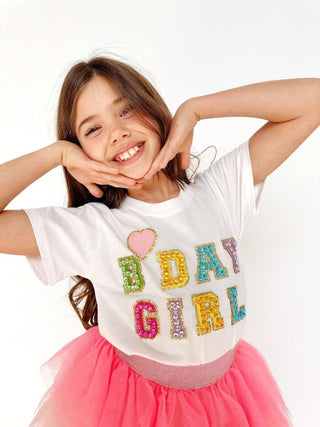 Lola and The Boys Birthday Girl Gem T-Shirt - White
Young girl wearing a 'Birthday Girl' shirt with colorful letters on a white background