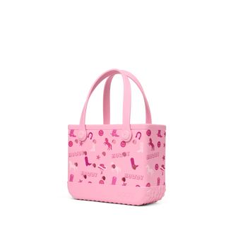 Bitty Bogg® Bag - Bogg N' Boots
Pink handbag with patterns on a white background
