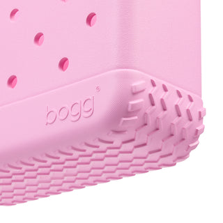 Bitty Bogg® Bag - Sweet Treats: Pink Taffy
Close-up of a pink rubber shoe with 'bogg' branding on a white background