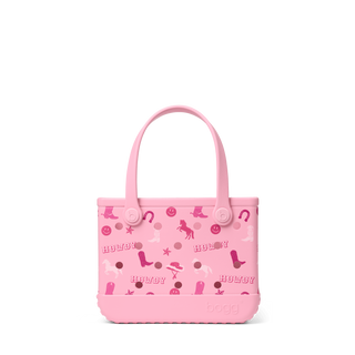 Bitty Bogg® Bag - Bogg N' Boots
Pink handbag with various designs and text on a white background