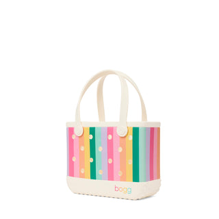 Bitty Bogg® Bag - Liquid Sunshine - Color Burst
Colorful striped tote bag with polka dots on a white background