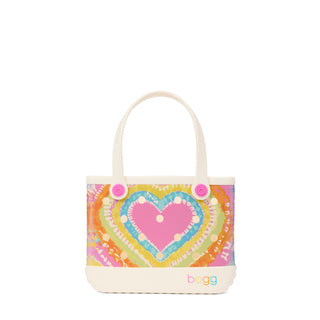 Bitty Bogg® Bag - Liquid Sunshine - Taffy
Tote bag with a colorful heart design and 'bagg' branding on a white background