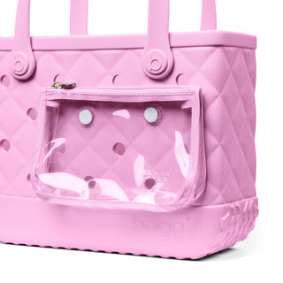 Bitty Bougie Bogg® Bag - Quilted Pink Taffy
Pink quilted handbag with a clear pouch on a white background