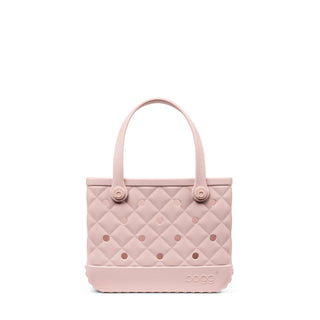Bitty Bougie Bogg® Bag - Quilted Rose Petal
Pink quilted handbag with polka dots on a white background