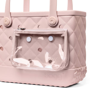 Bitty Bougie Bogg® Bag - Quilted Rose Petal
Pink quilted handbag with a clear pouch on a white background