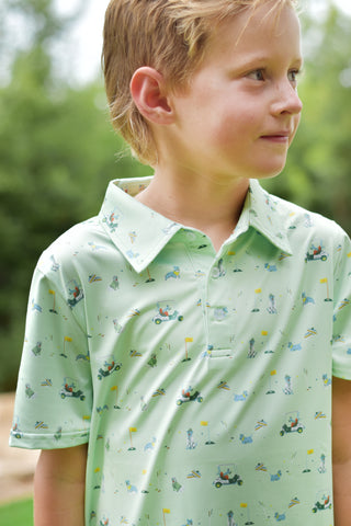 BlueQuail Clothing Co Polo Short Sleeve Shirt - Dogwood
Young boy wearing a light green polo shirt with vehicle pattern outdoors