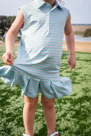 BlueQuail Clothing Co Polo Sleeveless Dress - Sherbet Stripe
Child wearing a light blue striped dress with a ruffled skirt on a grassy field.
