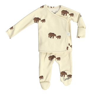 Bonsie Footie - Mama Bear
A baby long-sleeve footed sleeper set in cream, featuring a brown bear and bear cub print, shown on a plain white background.