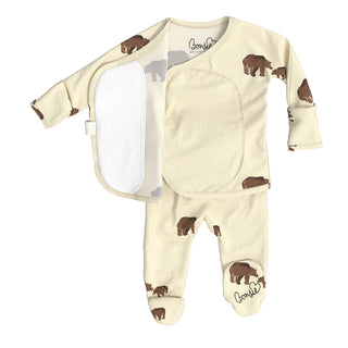 Bonsie Footie - Mama Bear
A cream-colored baby footed sleeper with a matching wearable diaper cover, featuring a brown and gray bear print and the brand name 'Bonnie' on the foot and inside the collar, displayed on a clean white background.