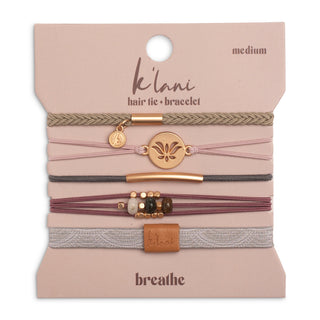 K'lani "Breathe" Lotus Flower Earthy Tones Hair Tie Bracelets
Set of hair ties and bracelets on a 'klari' branded card with 'breathe' text.