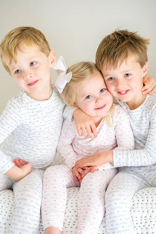 The Uptown Baby bamboo long sleeve pajamas set for big brother, featuring a cozy romper with long sleeves and soft fabric.