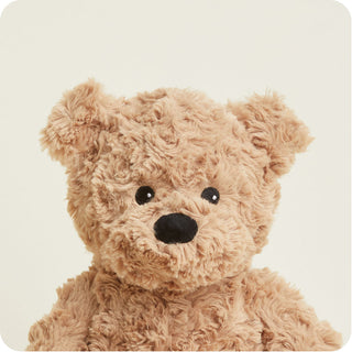 Brown Curly Bear Warmies
Beige teddy bear on a light beige background