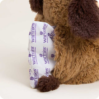 Brown Dog Warmies for Pets
Brown teddy bear with a Warmies product wrapped in its paw on a white background