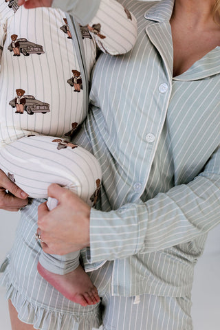 In My Jammers Cruisin Teddy zipper romper pajamas featuring a playful print and comfortable fit, shown on a flat lay.