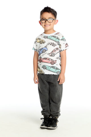 Chaser Extreme Speed Racing Tee
Child wearing a t-shirt with car designs on a white background