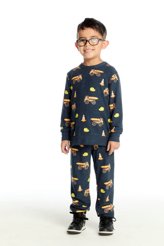Chaser Construction Trucks Long Sleeve Pullover
Child wearing navy blue pajamas with vehicle prints on a white background