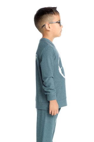 Chaser Goal Getter Long Sleeve Pullover
Child wearing a blue tracksuit with a logo on a white background