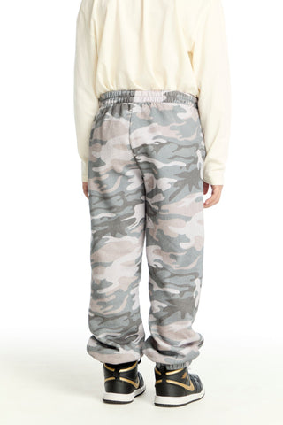Chaser Desert Camo Jogger
Person wearing camouflage pants and a cream sweater on a white background