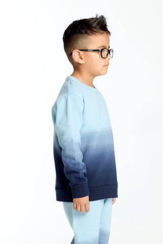 Chaser Malibu Blue Ombre Pullover
Child wearing a blue and white gradient sweatshirt on a white background