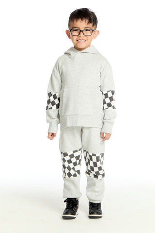 Chaser Checker Colorblock Hoodie
Child wearing a gray hoodie and pants with checkered patterns on a white background