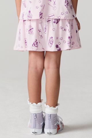 Chaser Allover Sweets Skort with a checkered pattern, lightweight fabric, and side pockets, perfect for casual summer wear.