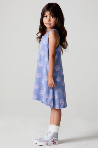 Chaser Seashell Dreams allover dress with seashell pattern, flowy fabric, and casual summer style, shown on a model.