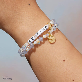 Be Kind Little Words Project Bracelet - Disney Princess: Cinderella
Bracelet with 'BE KIND' charm on a wrist against a light background