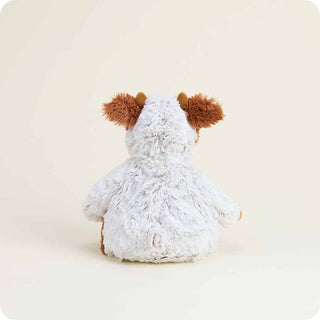 Cinnamon Latte Cow Warmies
Plush toy resembling a dog with white fur and brown ears on a beige background