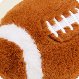 Football Warmies
Close-up of a plush football toy with brown and white colors.