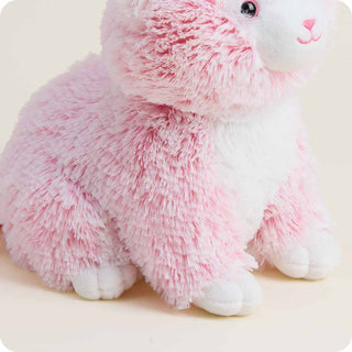Pink Kitten Warmies
Plush toy rabbit with pink and white fur on a light background