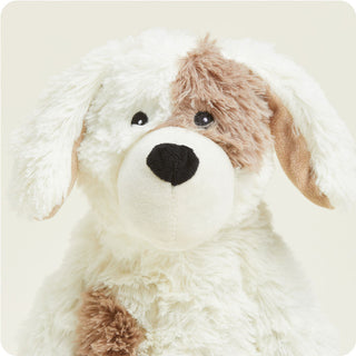 Puppy Warmies
Plush dog toy with white fur and brown patches on a beige background